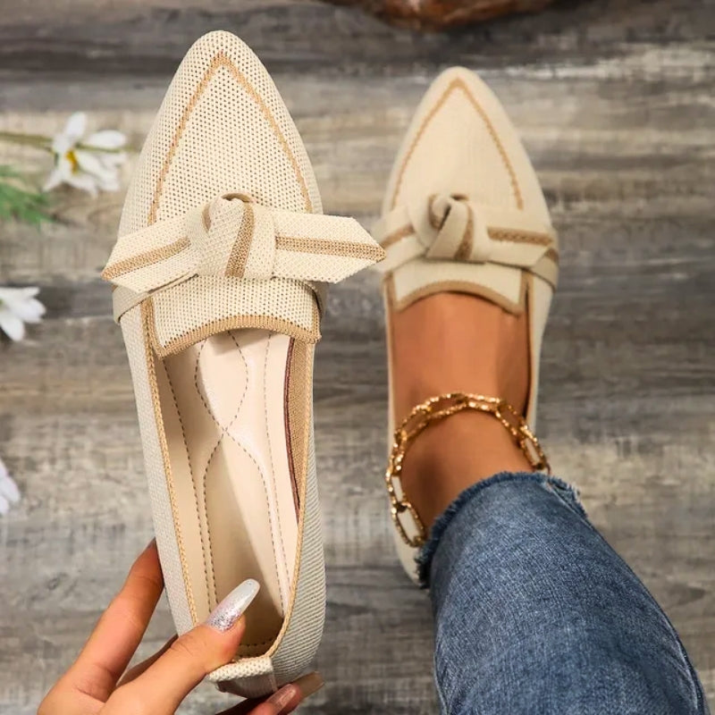 Elegant blue slip-on ballet flats for women, versatile footwear perfect for casual or everyday wear.