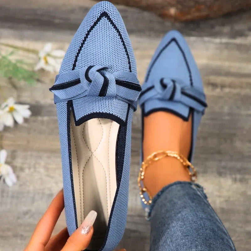 Black Orlena ballet flats, versatile slip-on women's shoes offering elegant style and everyday comfort.