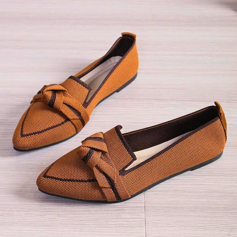 Stylish brown women's ballet flats, comfortable and casual everyday footwear with a unique twisted toe.