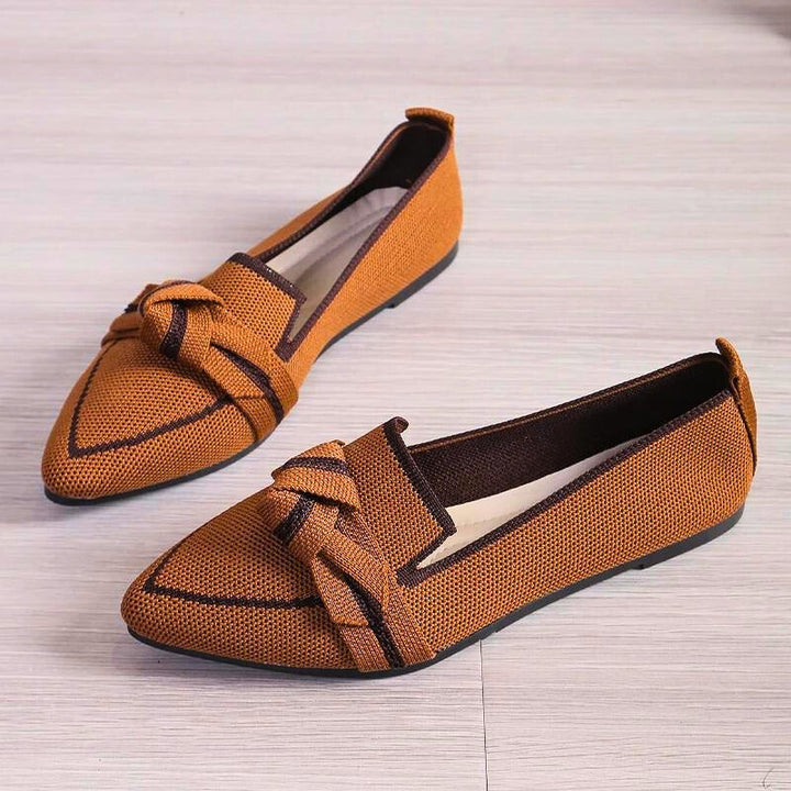 Stylish brown women's ballet flats, comfortable and casual everyday footwear with a unique twisted toe.