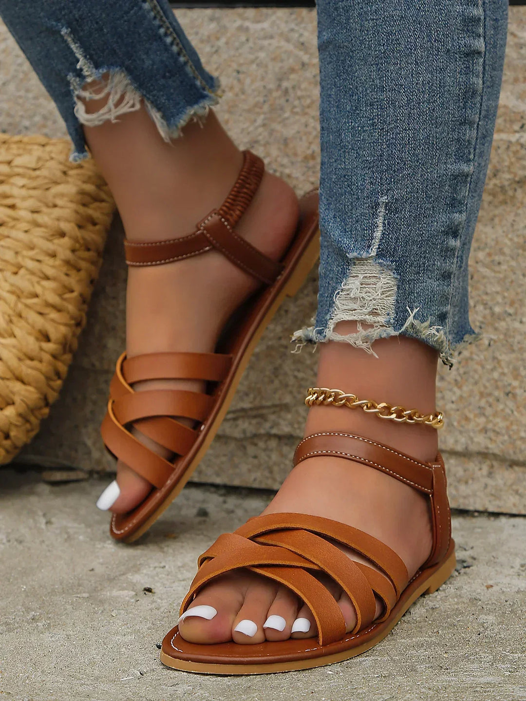 Casual brown women's summer sandals, Roman inspired, offering comfort and a reliable non-slip sole for travel.