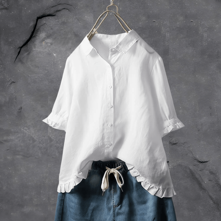 Elegant women's cotton blouse. Versatile for stylish women, perfect for spring & summer outfits.