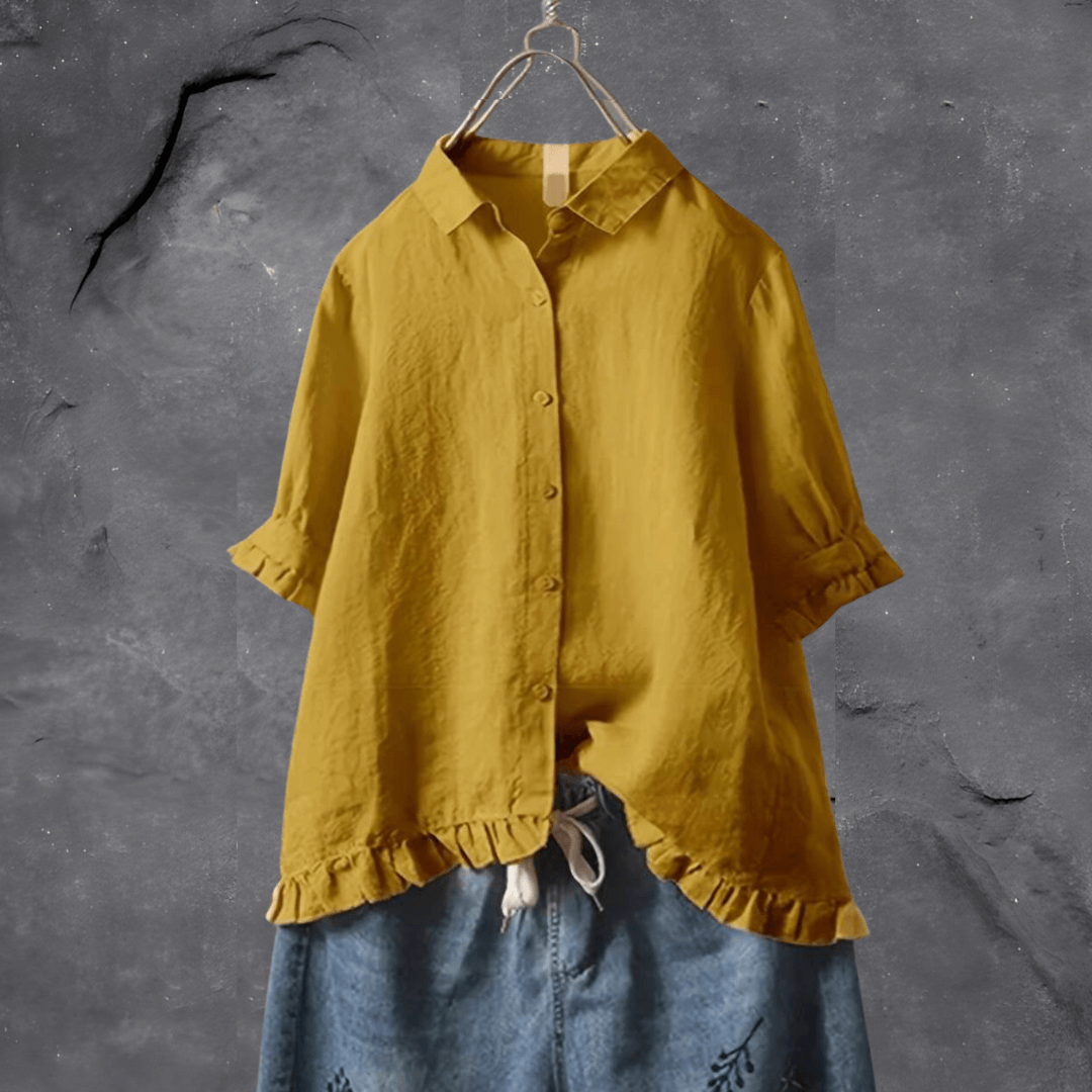 Chic women's cotton blouse, a fashion staple for easy elegance. Ideal for casual wear & versatile styling.