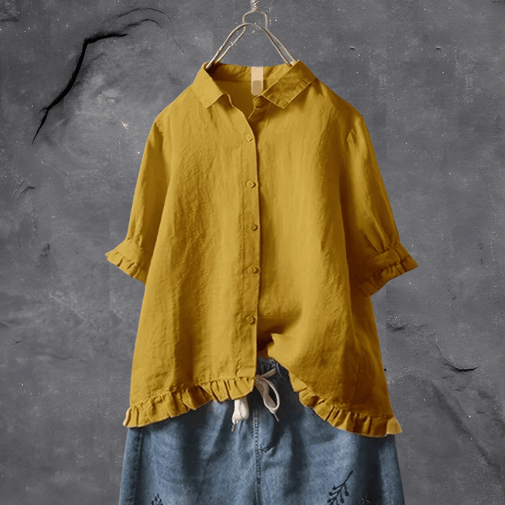Chic women's cotton blouse, a fashion staple for easy elegance. Ideal for casual wear & versatile styling.