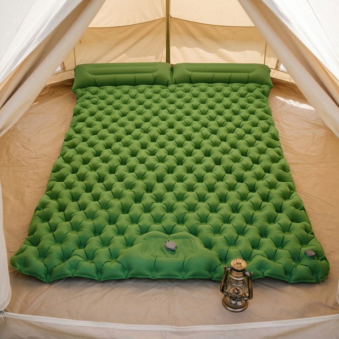Comfortable double camping air mattress for two, an inflatable sleeping pad perfect for outdoor adventures.