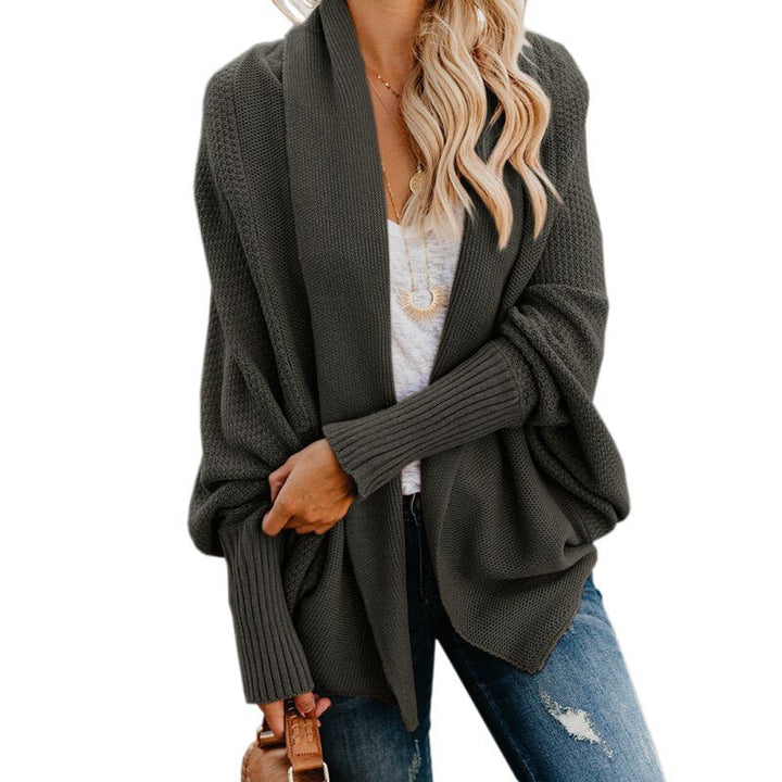 Easy-to-style oversized women's cardigan, a versatile top for casual elegance & seasonal comfort.