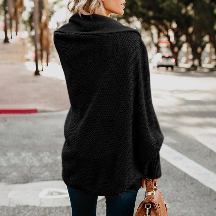 Versatile oversized women's cardigan, perfect as a stylish wrap for seasonal layering & comfort clothing.