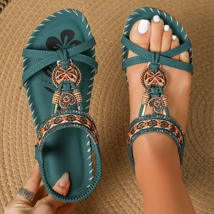 Comfortable women's boho flat T-strap orthopedic sandals with elastic strap, ideal for summer casual wear.