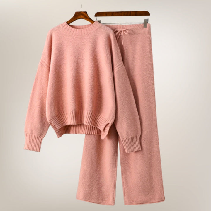 Comfortable women's casual two-piece lounge set. Relaxed fit matching top & pants for everyday style.