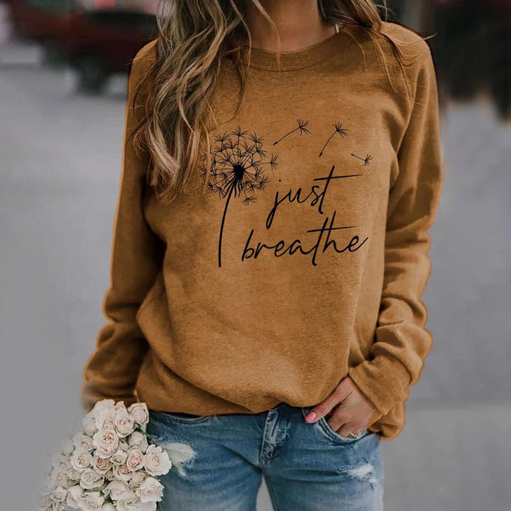 Comfortable women's crewneck sweatshirt in a soft fabric, perfect for everyday casual wear & loungewear.