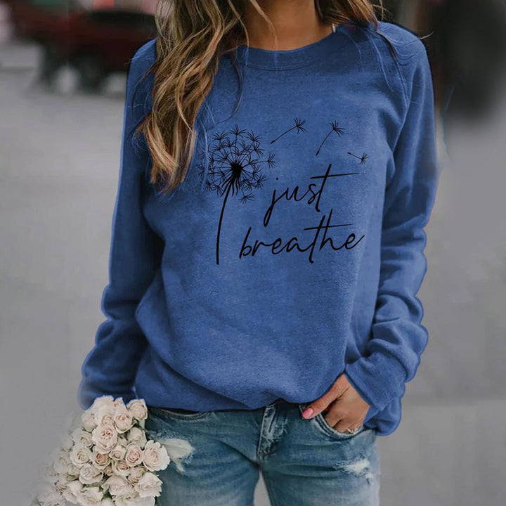Stylish women's long-sleeve sweatshirt, a versatile crewneck top for trendy everyday fashion.