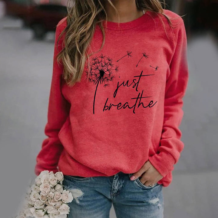 Soft women's everyday sweatshirt, a comfortable & stylish long-sleeve crewneck top for loungewear.