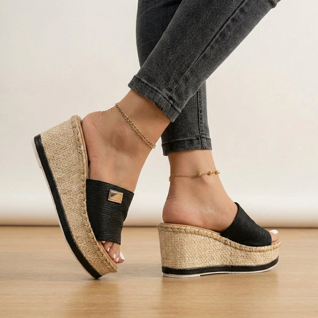 Comfortable women's espadrille wedge sandals with a stylish textured strap, perfect for summer casual wear.