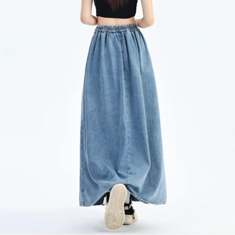 Light blue women's casual denim skirt. Comfortable midi length with an elastic waist for daily wear.
