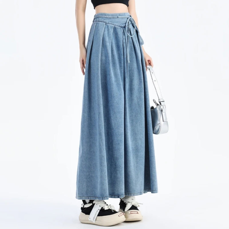 Elastic waist women's denim midi skirt in blue. A comfortable and versatile piece for everyday casual outfits.
