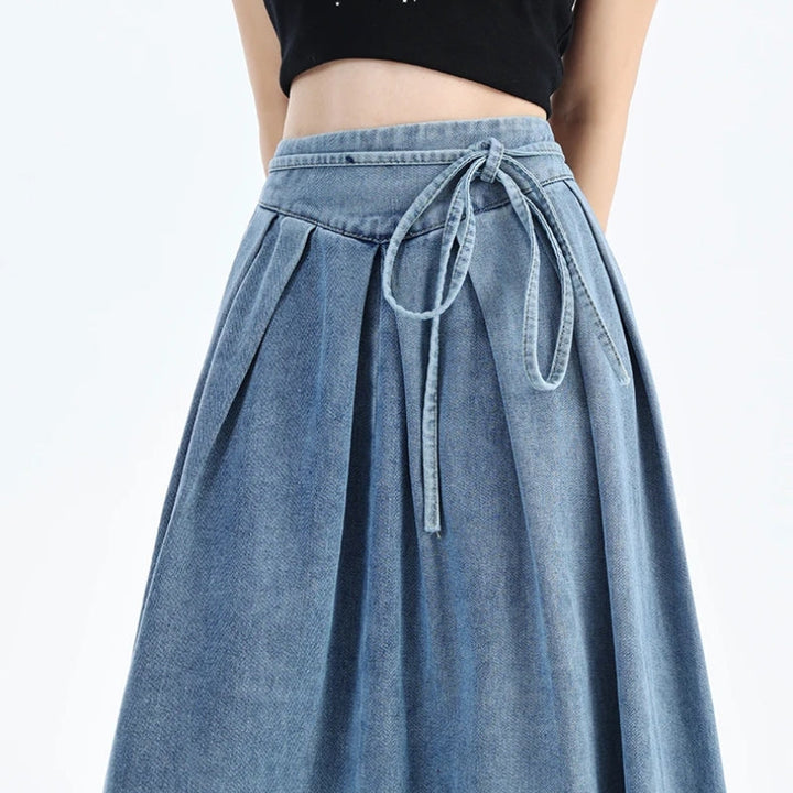 Women's comfortable midi denim skirt with elastic waist, perfect for versatile, casual everyday fashion in blue.
