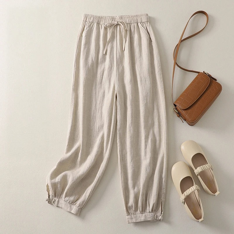 Pink women's harem pants, comfortable relaxed fit with a stylish tapered leg. Great for casual spring & summer fashion.