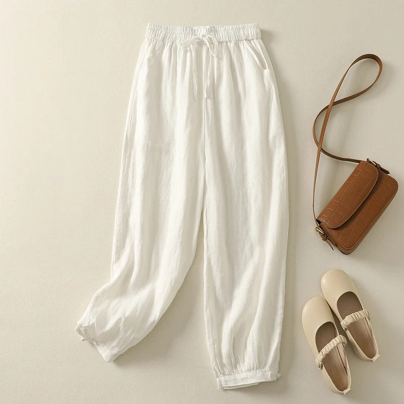 Soft casual women's harem pants, featuring a flattering tapered fit and comfy elastic waist for all-day versatile wear.