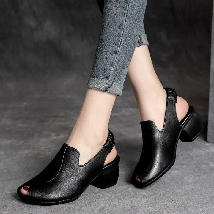 Stylish women's peep-toe sling heels with a sturdy block heel, designed for all-day comfort and elegance.