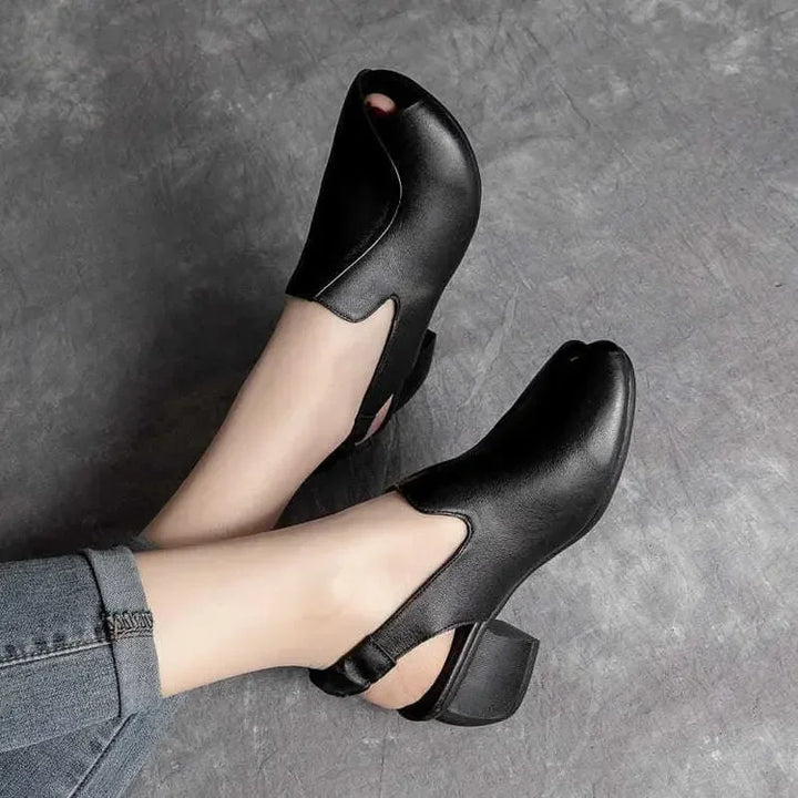 Women's elegant peep-toe sling heels with a comfortable block heel, ideal for chic spring and summer looks.