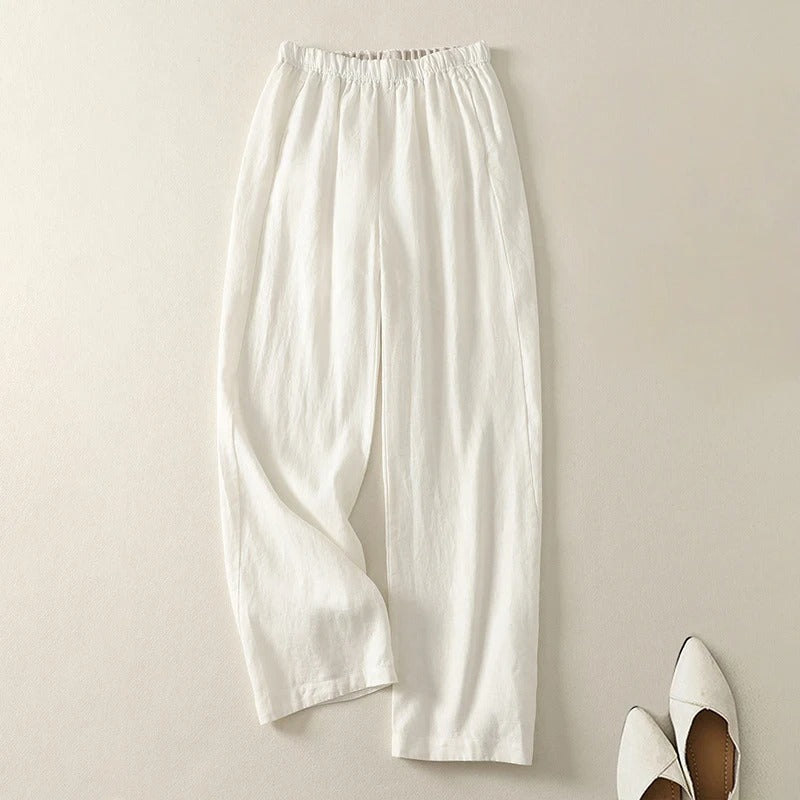 Woman wearing flowy relaxed straight leg pants, perfect for comfortable, elegant movement and versatile everyday fashion.