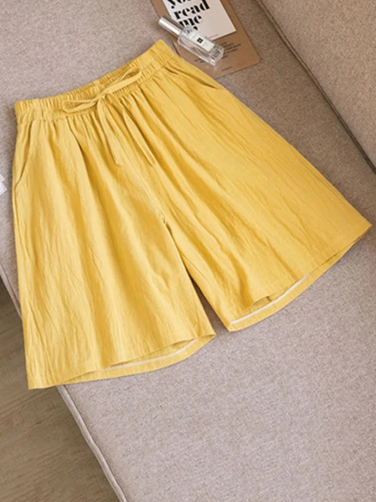 Breathable Melina women's shorts featuring a stretch waist for ultimate comfort. Perfect lightweight summer bottoms.