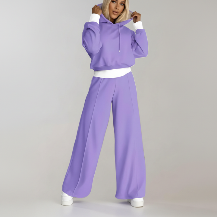 Relaxed fit women's two-piece set featuring a cozy hoodie and wide leg pants