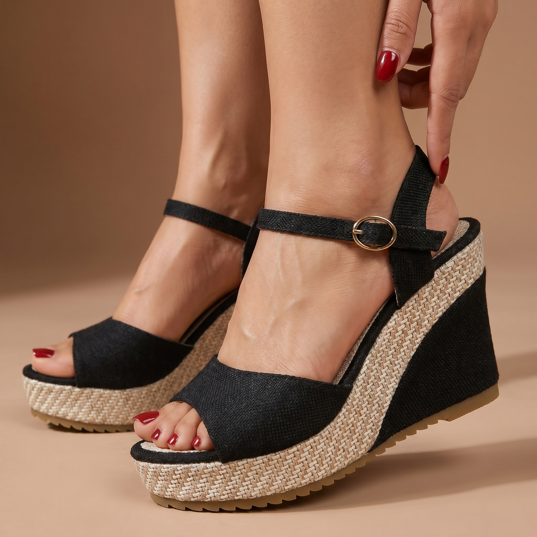 Elegant women's wedge heels featuring a chic ankle strap, ideal for dressy occasions & fashion.