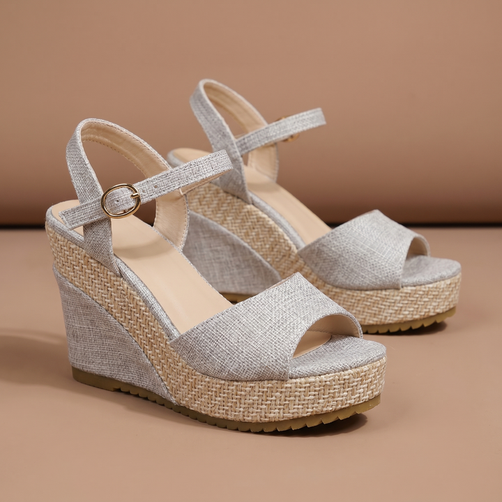 Comfy women's wedge heels with an ankle strap, perfect elegant footwear for stylish spring & summer.