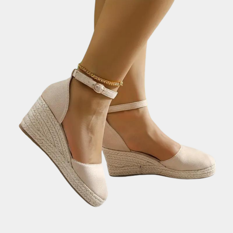Comfortable women's wedge sandals with adjustable strap, ideal for all-day summer wear.
