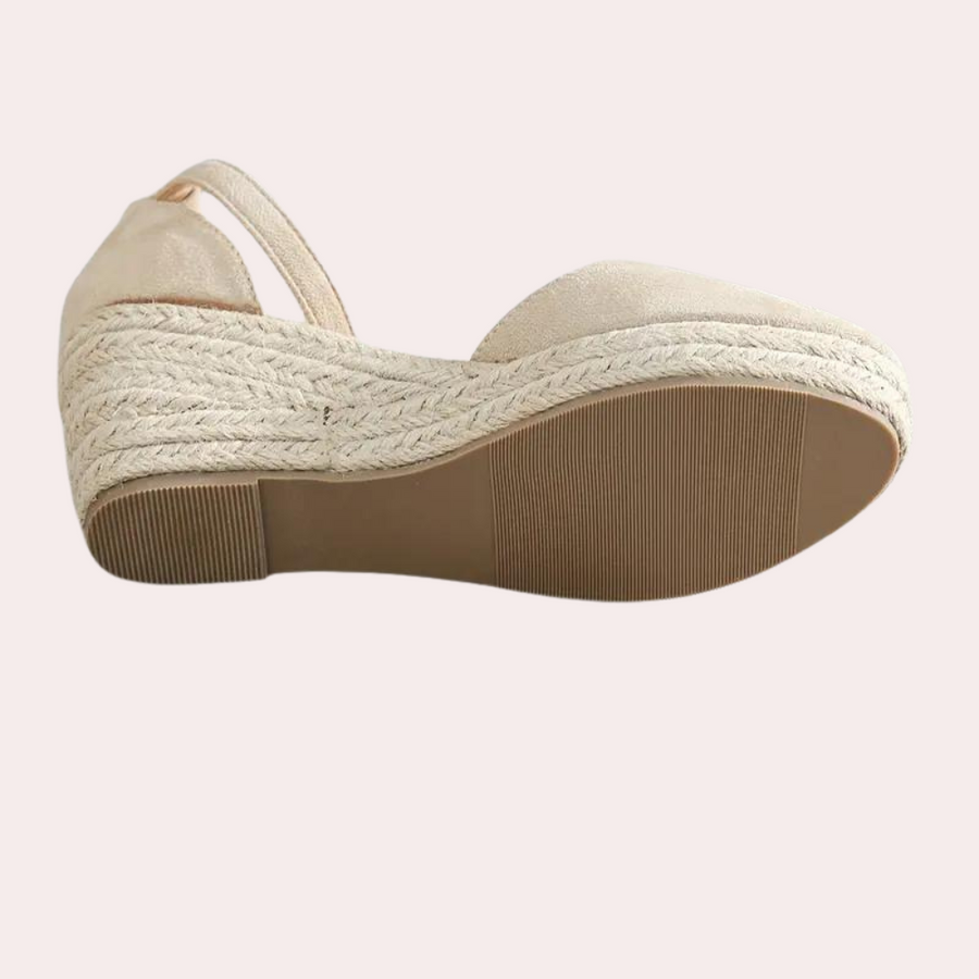 Stylish women's wedge sandals with an adjustable strap, perfect comfortable summer footwear for any occasion.