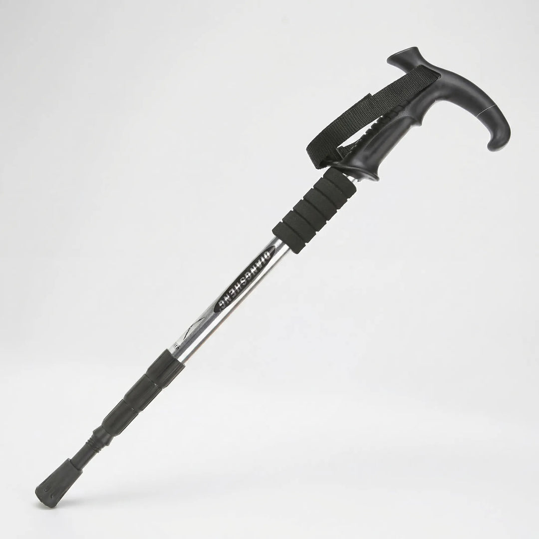 Easy-pack 4-section folding trekking pole, ideal for travel. Lightweight adjustable hiking stick for trail stability.
