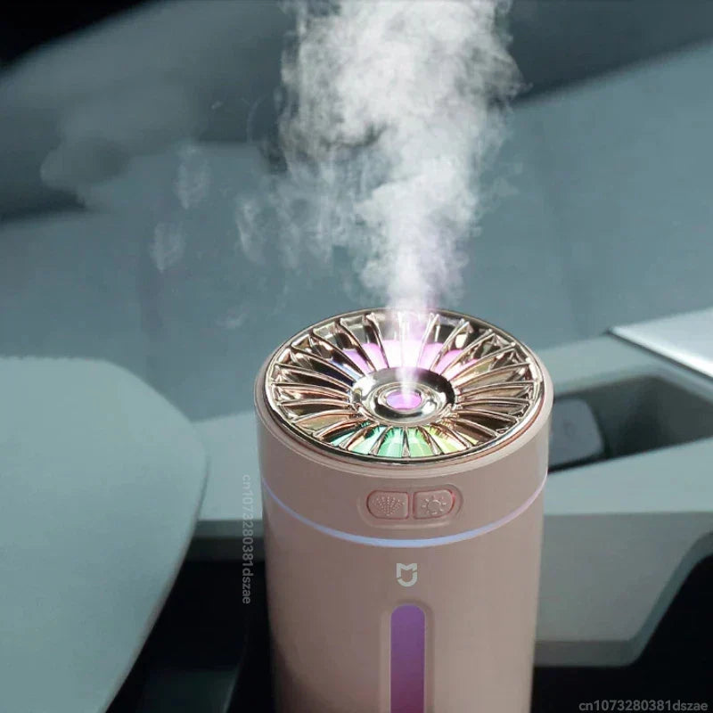 USB portable humidifier emitting fine mist, promoting healthy living and better indoor air quality quietly.
