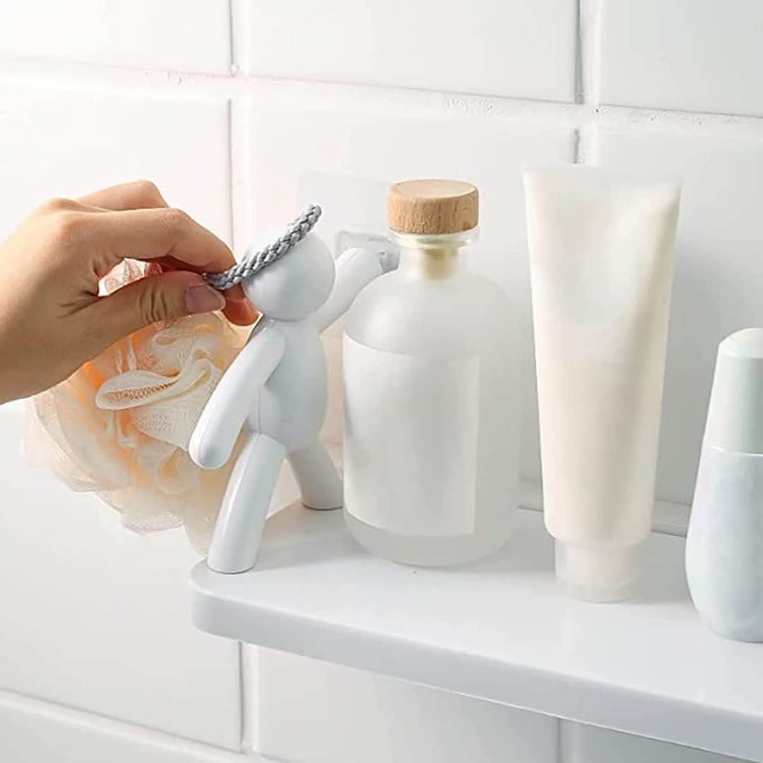 Modern white bathroom wall shelf, playful accent, perfect for organizing toiletries