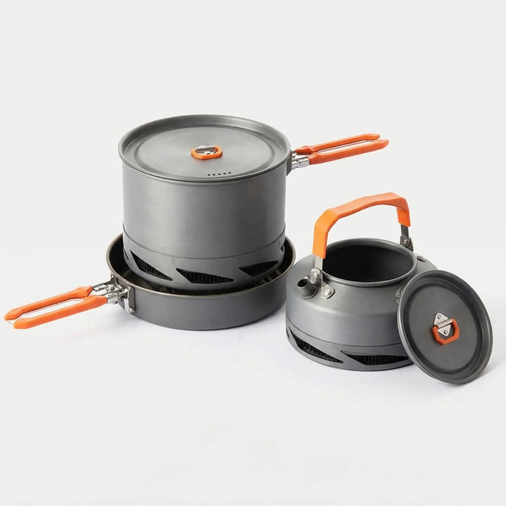 Complete outdoor camping cookware set for camp kitchen, featuring heat exchanger pot and nonstick surfaces.