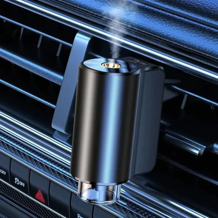 Compact car aromatherapy diffuser, USB powered, for essential oils & vehicle fragrance.