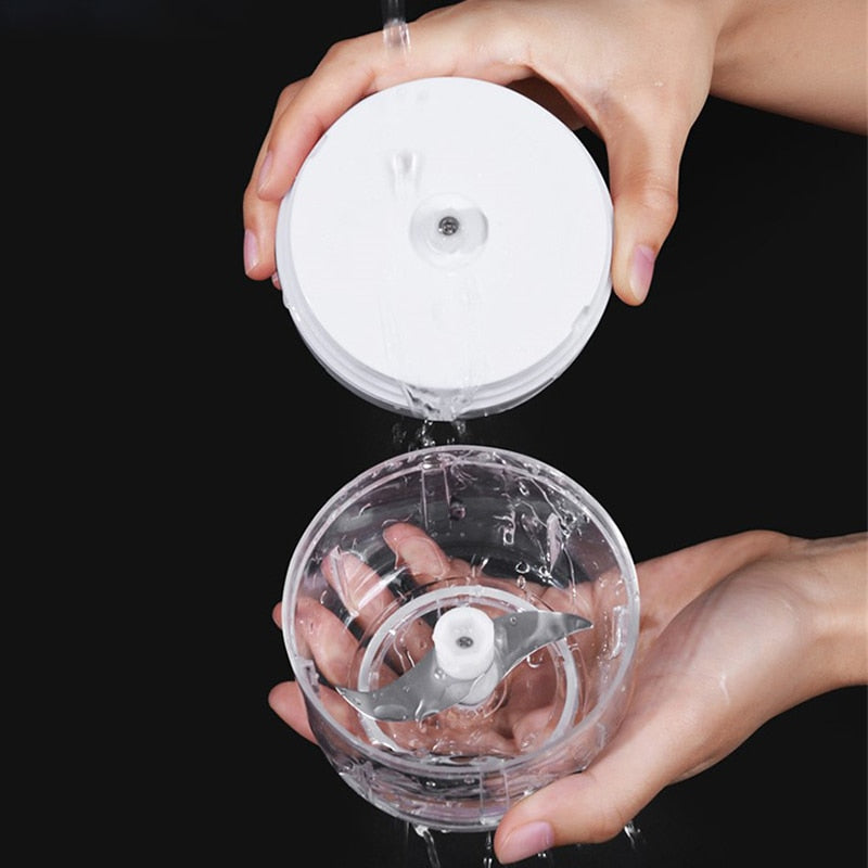 Compact electric food chopper, perfect for small kitchens & quick food prep.
