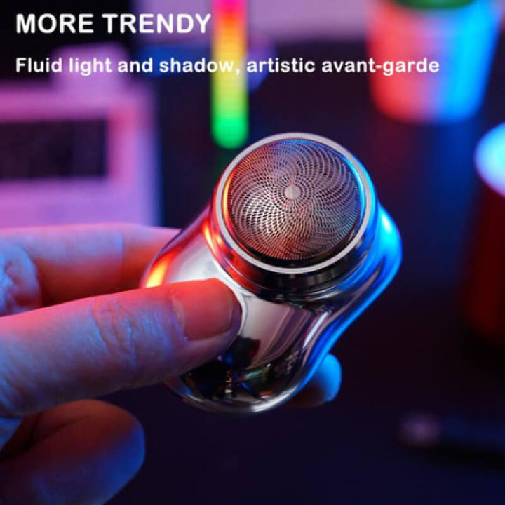 Small electric mini shaver for men, rechargeable and ideal for precise facial & body grooming with close results.