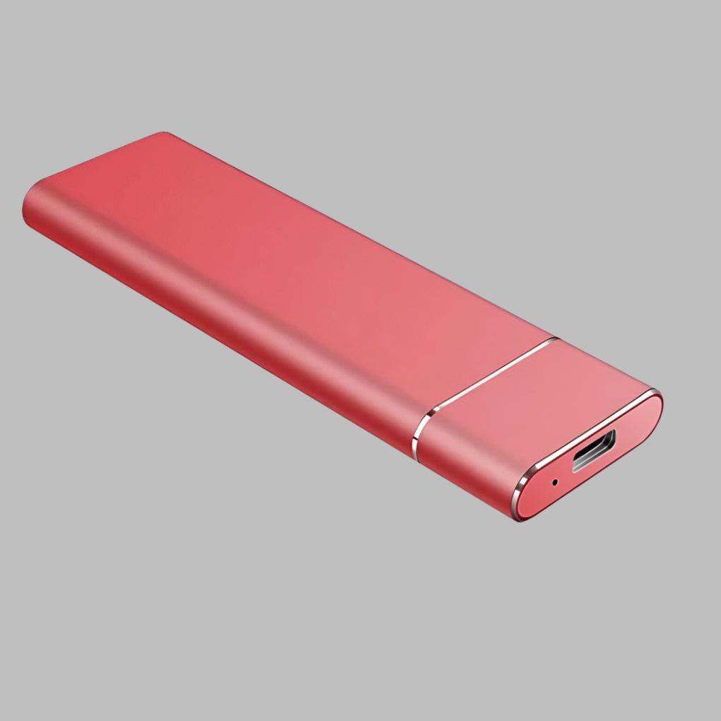 Sleek aluminum external solid state drive, compact for on-the-go data backup & fast digital storage.