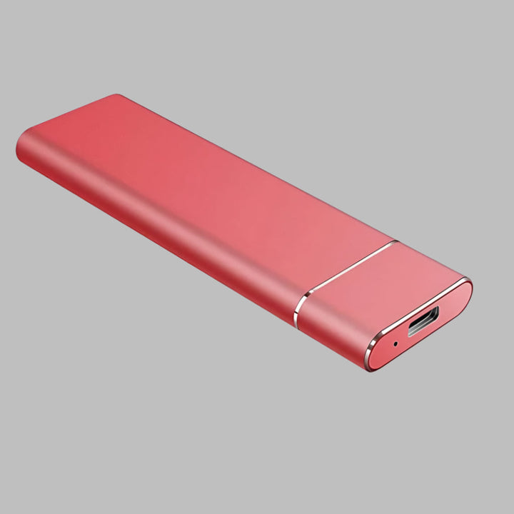 Sleek aluminum external solid state drive, compact for on-the-go data backup & fast digital storage.