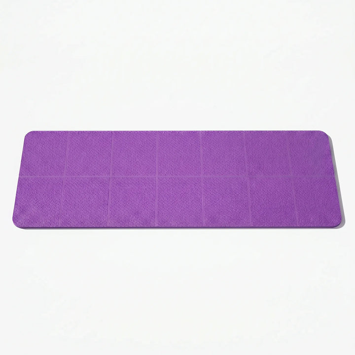 Foldable travel yoga mat in a neat stack, ideal for easy portability & storage. Non-slip TPE for all exercises.