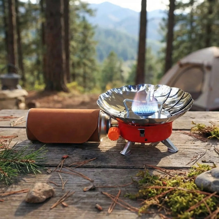 Compact folding camp stove, ideal for outdoor cooking, travel, and camping. Portable burner for hiking gear & backpacking.