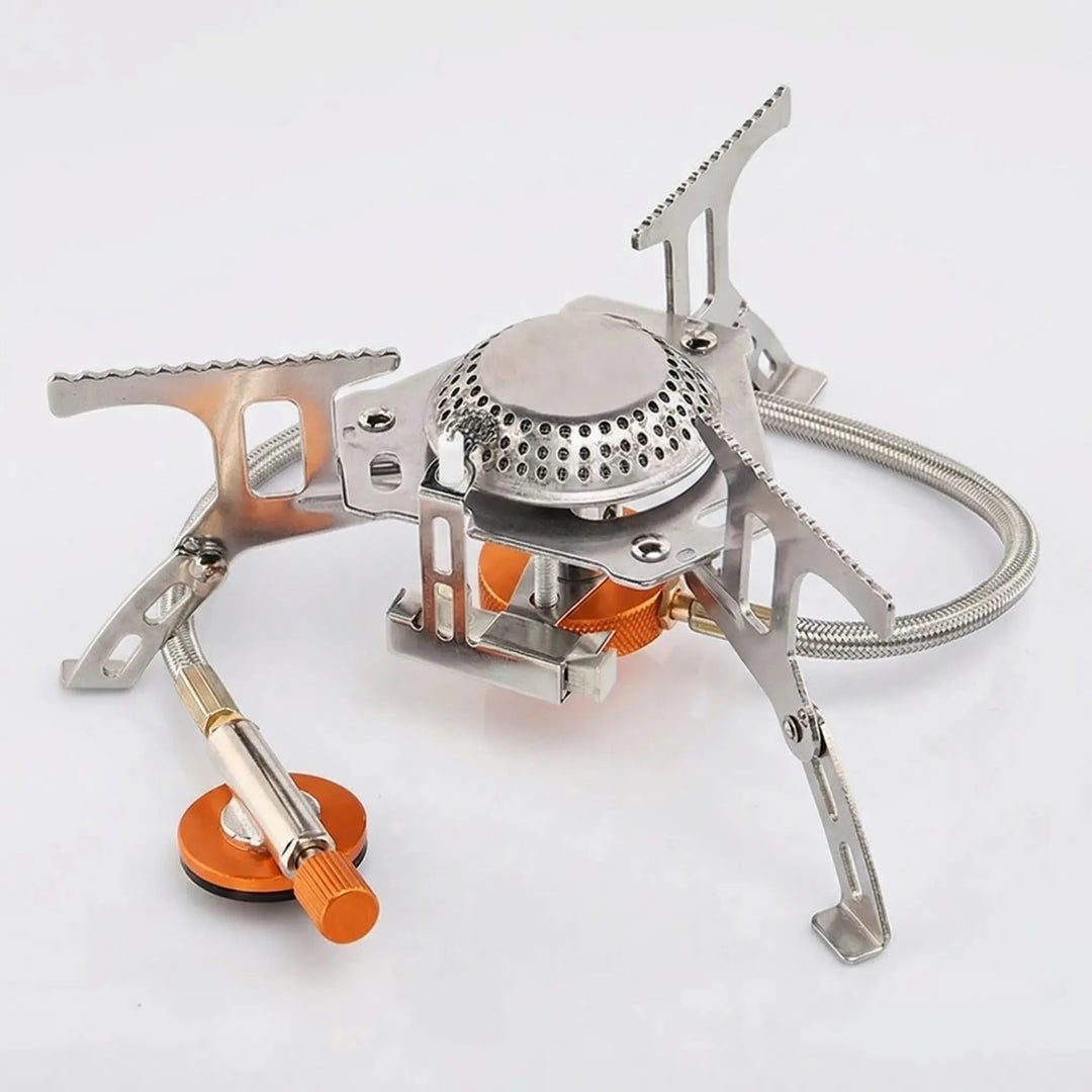 Durable compact folding gas stove for efficient outdoor cooking and camp essentials.