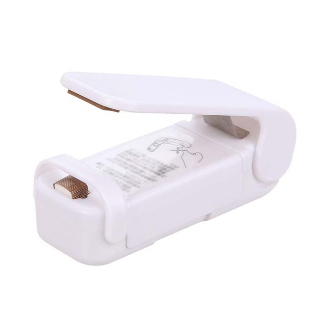 Compact FreshLock bag sealer, a portable kitchen gadget for sealing plastic bags & keeping food fresh.