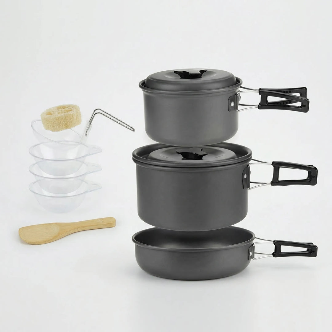 Backpacking cookware set with pot, pan, & lid, perfect for a compact outdoor travel kitchen.