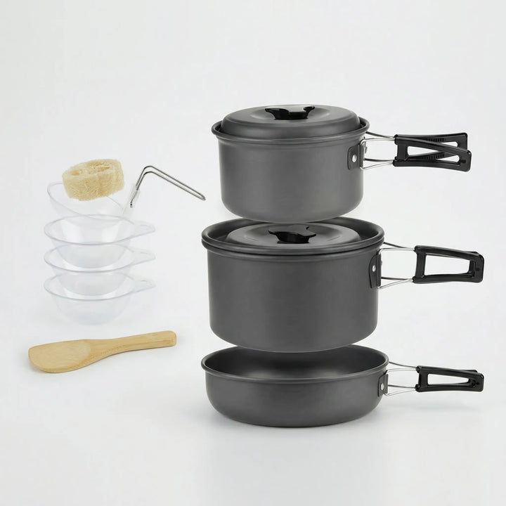 Backpacking cookware set with pot, pan, & lid, perfect for a compact outdoor travel kitchen.
