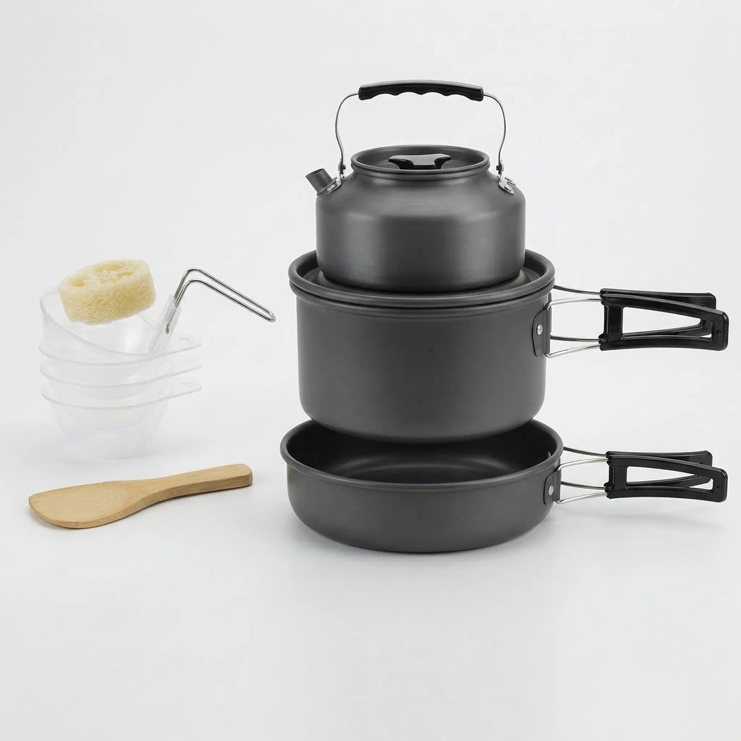 Preparing a meal with a compact outdoor camping cookware set while backpacking or hiking.