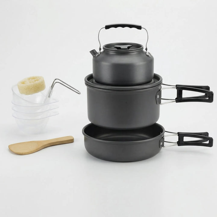 Preparing a meal with a compact outdoor camping cookware set while backpacking or hiking.