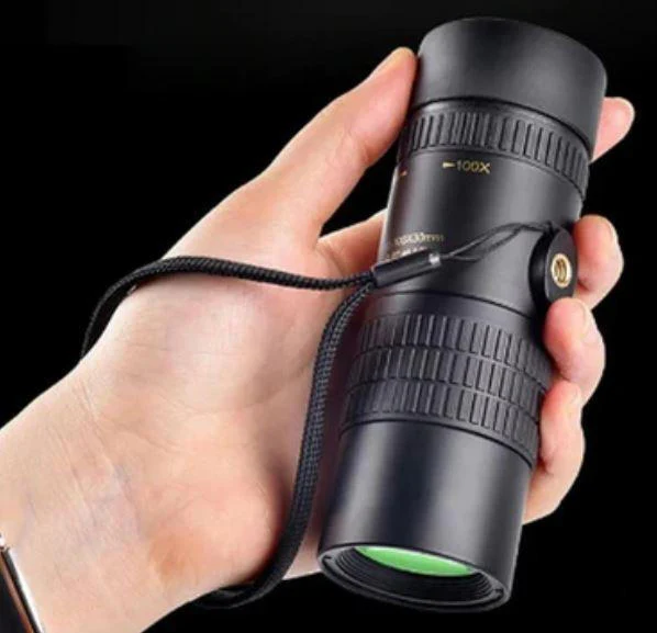 Unisex waterproof monocular telescope with night vision, ideal for camping, travel & wildlife observation.