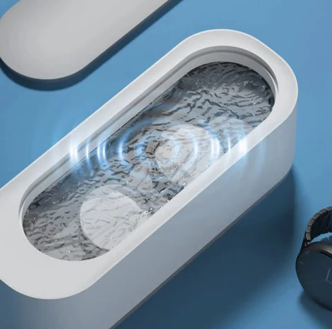 Efficient ultrasonic cleaner for jewelry & eyeglasses, providing professional-grade deep cleaning at home.